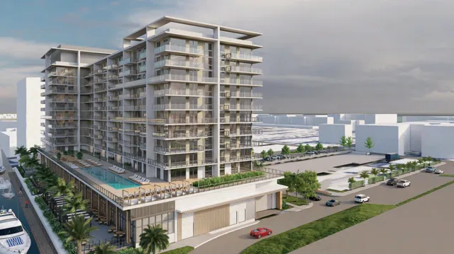 Two 120-foot towers designed by Nichols Architects would rise on Bokamper’s site – Sun Sentinel